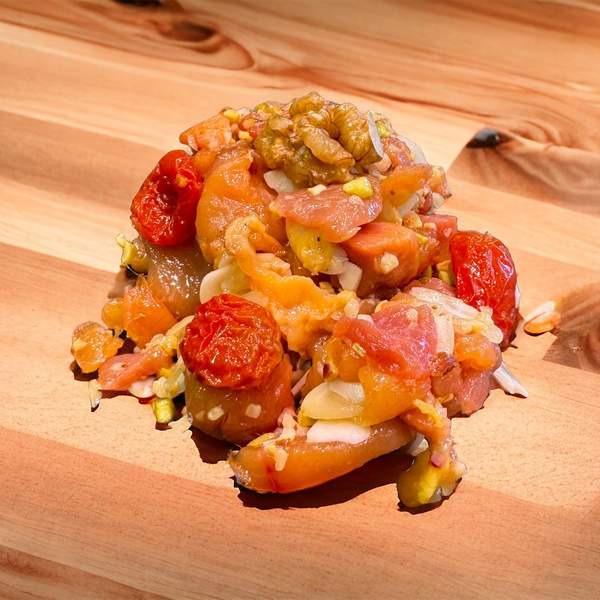 Bocconcini di pollo con frutta secca